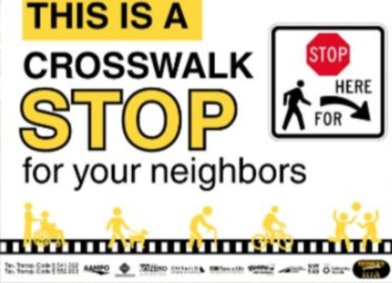 Attention sign indicating a crosswalk stop for pedestrians, encouraging drivers to yield for neighbors.